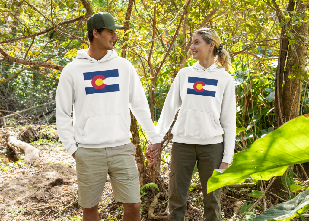 Couple Wearing Colorado State Flag Hoodies